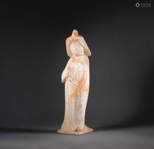 Tang Dynasty A large pottery figure of a court lady