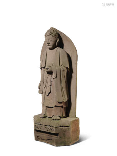 Ming Dynasty, dated by inscription to the 21st year of the Jiajing reign corresponding to 1542 and of the period A massive carved stone figure of the Buddha