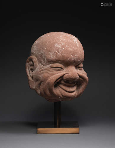 14th/15th century  A rare sandstone head of a luohan