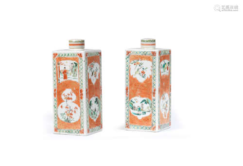 Kangxi  A pair famille verte of coral-ground square jars and covers