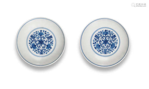 Jiaqing seal marks and of the period A rare pair of blue and white 'longevity' saucer-dishes