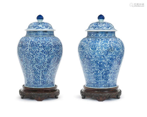 Kangxi A large Pair of blue and white jars and covers