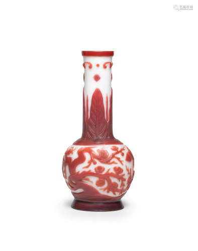 Qianlong four-character mark and of the period A red-overlay white glass 'prunus and bamboo' vase