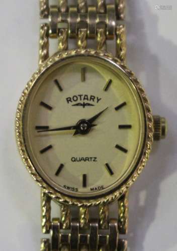 A Rotary Quartz 9ct gold oval cased lady's bracelet wristwatch, the signed gilt dial with gilt baton