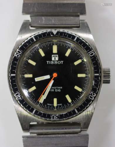 A Tissot Seastar PR 516 steel cased gentleman's wristwatch, the signed black dial with baton hour