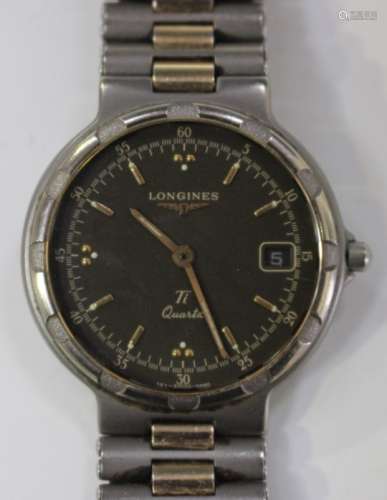 A Longines Conquest Ti Quartz titanium cased gentleman's bracelet wristwatch, the signed circular