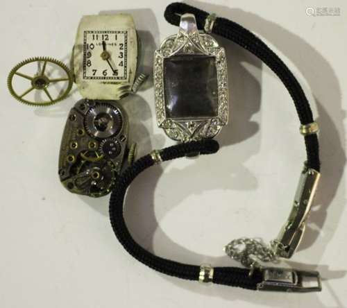 A platinum cased and diamond set lady's dress wristwatch, the silvered dial with black Arabic