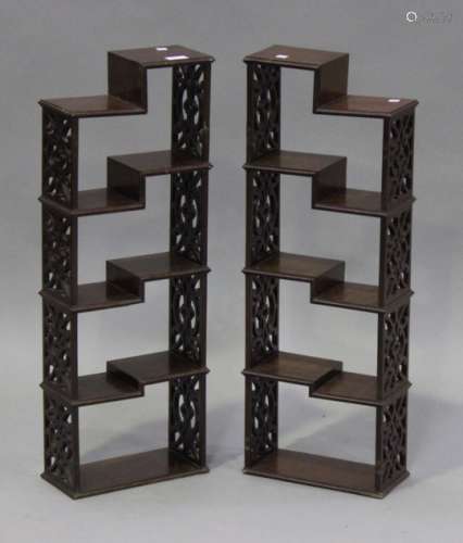 A pair of 20th century mahogany fretwork free-standing asymmetrical shelves, height 79cm, width