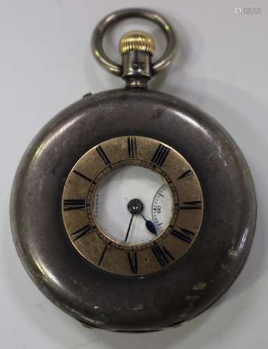 A Victorian silver and gold keyless wind half-hunting cased gentleman's pocket watch, the gilt