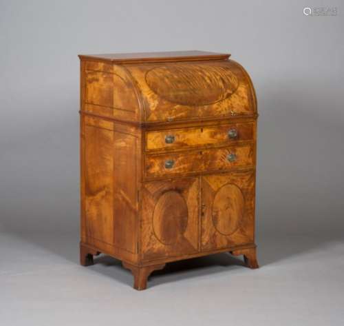 A 19th century narrow satinwood roll-top writing desk with boxwood and ebony stringing, the fitted