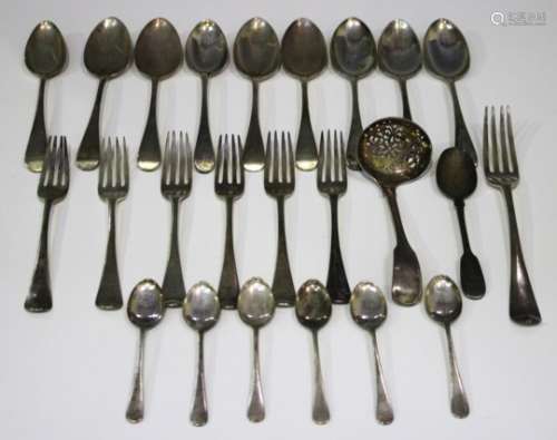 A George III part canteen of silver Old English pattern cutlery, comprising eleven table forks,