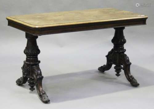 A Regency rosewood rectangular centre table, the moulded top raised on turned and carved baluster