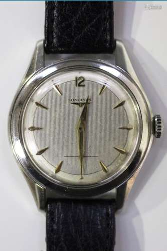 A Longines stainless steel cased gentleman's wristwatch, circa 1957, the signed jewelled movement