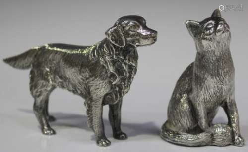 A mid-20th century plated cast model of a standing Golden Retriever, length 15cm, together with a