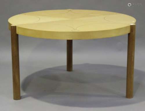 A modern Art Deco style maple circular dining table, the top with line inlaid decoration, the
