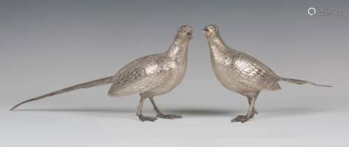 A pair of Elizabeth II silver models of a cock and hen pheasant with engraved plumage, London 1967