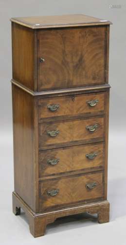 A small 20th century George III style mahogany tallboy, fitted with a cupboard above four drawers,