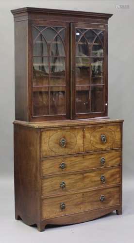A George III mahogany secrétaire bookcase cabinet, the moulded pediment above a pair of astragal