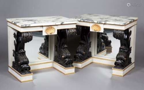 A pair of mid-20th century Italianate ebonized, painted and gilt console tables, the breakfront