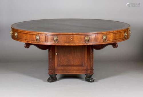 An impressive Regency mahogany revolving library table, after a design by Thomas Sheraton and