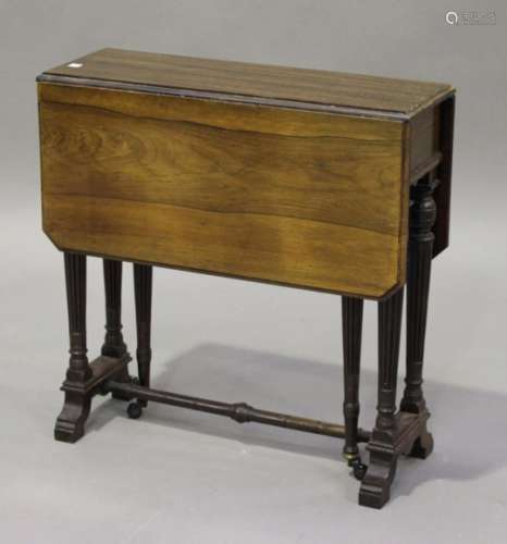 A late Victorian rosewood Sutherland occasional table, in the manner of Collinson & Lock, the canted