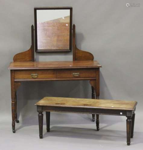 A late Victorian walnut dressing table by James Shoolbred & Co, height 148cm, width 107cm,