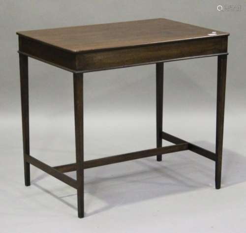A late 18th/early 19th century mahogany occasional table, the rectangular top on square tapering
