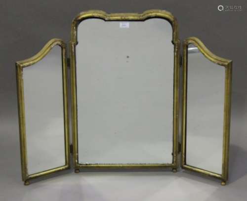 An early 20th century Queen Anne style gilt framed triptych dressing table mirror, height 76cm.