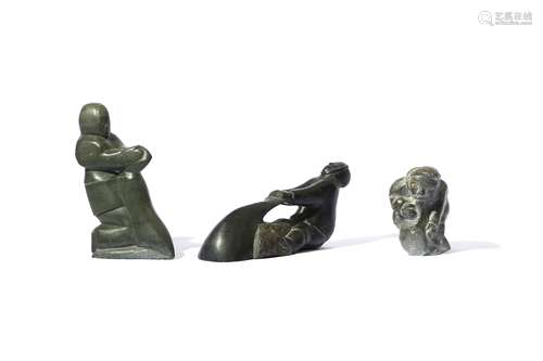 THREE ESKIMO STONE FIGURES