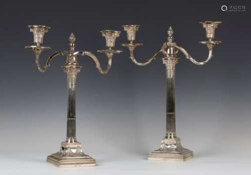A near pair of graduated late Victorian silver Corinthian column twin scroll branch candelabra, each