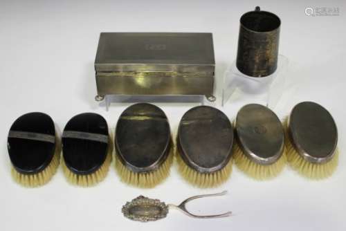 A group of silver items, including a rectangular cigarette box with engine turned decoration,
