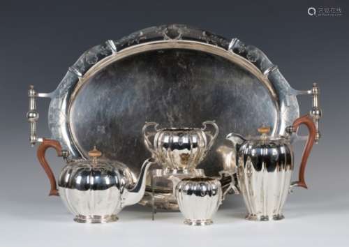 A George VI silver five-piece tea set of circular lobed form with engraved decoration, comprising