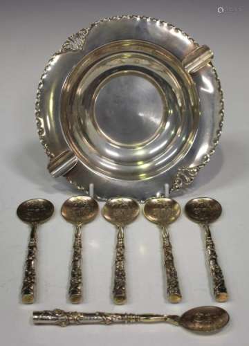 A set of six German .800 silver ice cream spoons, each tapering handle decorated in relief with