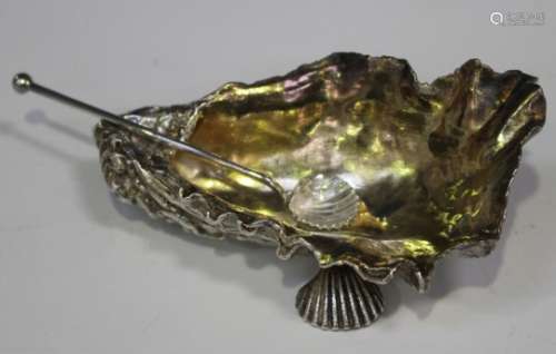 An Elizabeth II silver salt in the form of an oyster shell, London 1998 by Patricia Joan Hamilton,