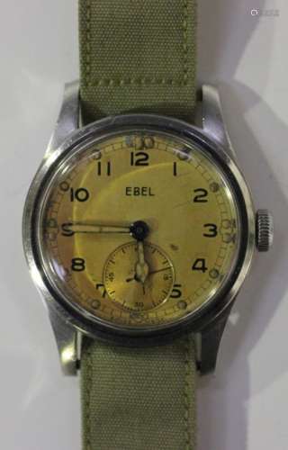 An Ebel MoD issue stainless steel cased gentleman's wristwatch, the signed gilt dial with black