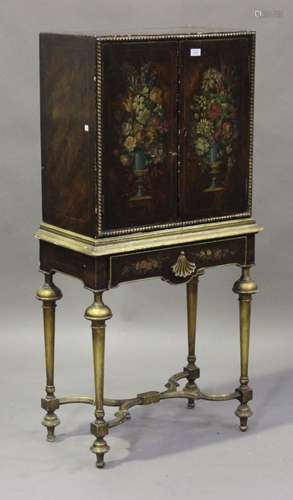 An early/mid-20th century William and Mary style faux walnut and parcel gilt cabinet-on-stand with