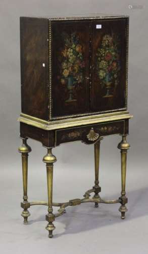 An early/mid-20th century William and Mary style faux walnut and parcel gilt cabinet-on-stand with