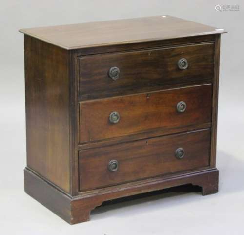 A George V mahogany chest of three long drawers, on bracket feet, height 81cm, width 84cm, depth