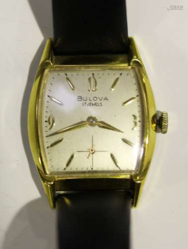 A Bulova gilt metal fronted and stainless steel backed curved rectangular gentleman's wristwatch,