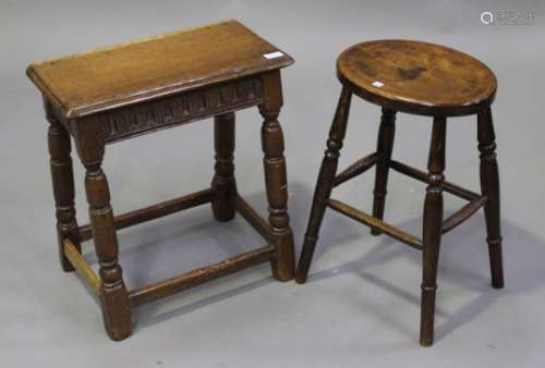 A 20th century Jacobean Revival oak joint stool, raised on turned and block legs, height 53cm, width