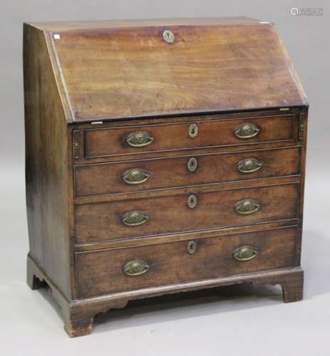 A George III mahogany bureau, the fall flap above four long drawers, on bracket feet, height