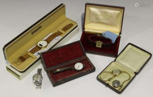A Vertex 9ct gold cased lady's wristwatch on a 9ct gold bracelet, an 18ct gold cased and rose cut