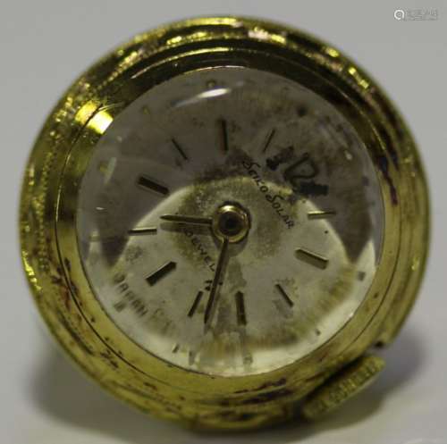 A Seiko Solar gold lady's ring watch, the signed silvered dial with gilt baton hour markers and