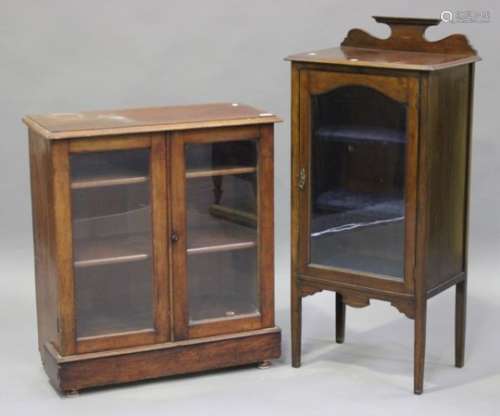 A Victorian and later mahogany bookcase, fitted with two glazed doors, on a plinth base, height