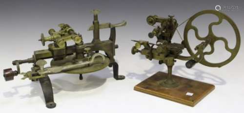 A late 19th/early 20th century brass watchmaker's wheel cutting lathe, on a wood plinth, length