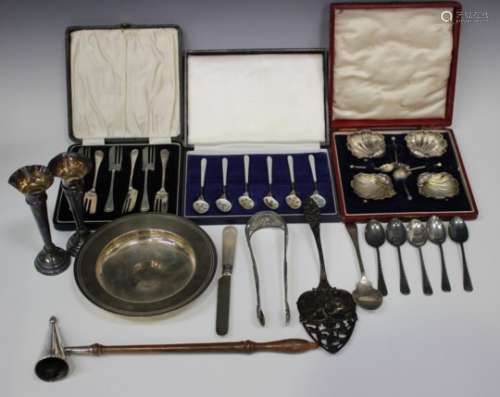 A collection of silver items, including six cake forks, Birmingham 1929 by A.J. Bailey, four scallop