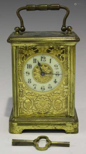 A late 19th/early 20th century French brass cased carriage timepiece with eight day movement, the