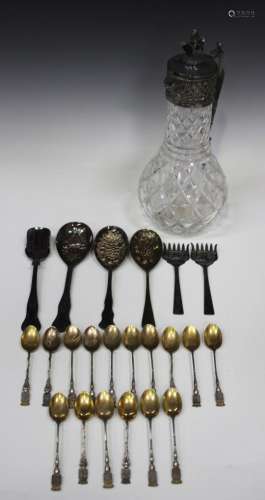 A group of sixteen French silver and silver gilt collectors' spoons, each with crest finial,