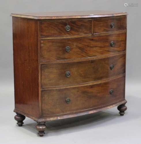 An early Victorian mahogany bowfront chest of two short and three graduated long drawers, on
