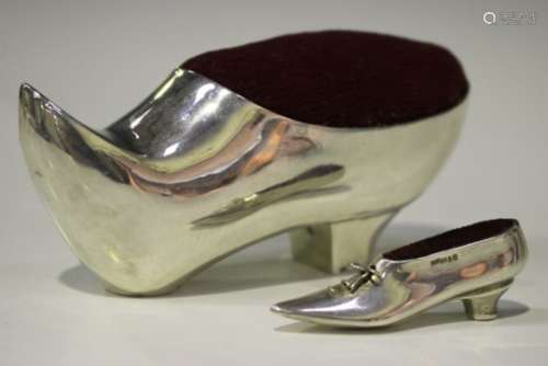 An Edwardian silver novelty pin cushion in the form of a shoe, Birmingham 1909 by George Nathan &